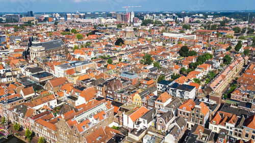 Aerial drone view of Leiden town cityscape from above, typical Dutch city skyline with canals and houses, Holland, Netherlands 