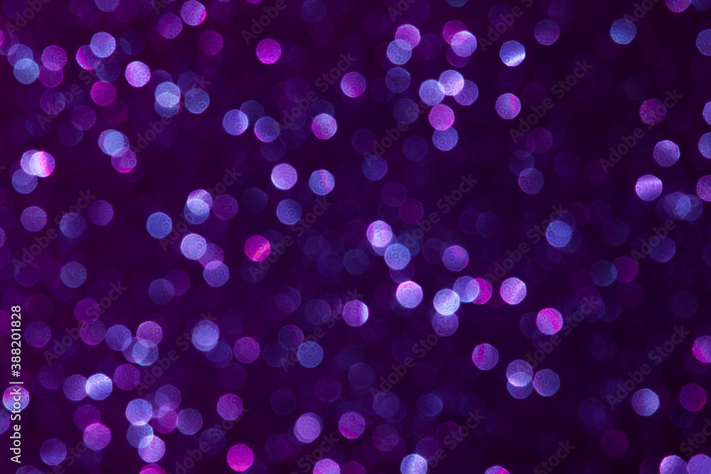 Abstract purple violet color dots defocused bokeh background. Holiday festive concept. 