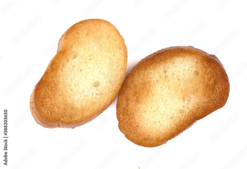 Toasted baguette slice isolated on white background Toasted baguette slice isolated on white background