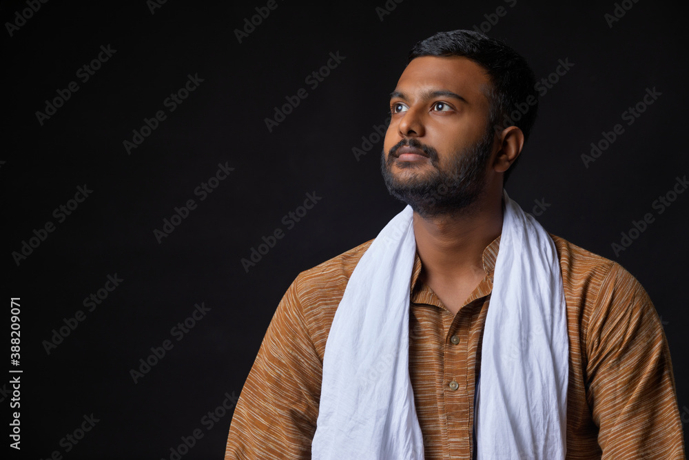 PORTRAIT OF A RURAL MAN LOOKING AWAY FROM CAMERA
PORTRAIT OF A RURAL MAN LOOKING AWAY FROM CAMERA