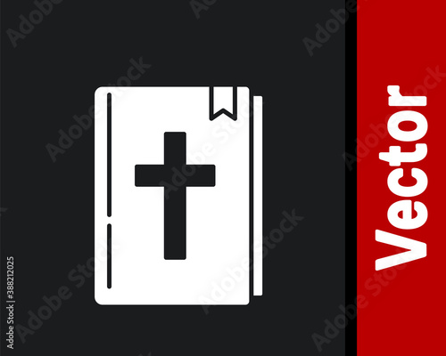 White Holy bible book icon isolated on black background. Vector.