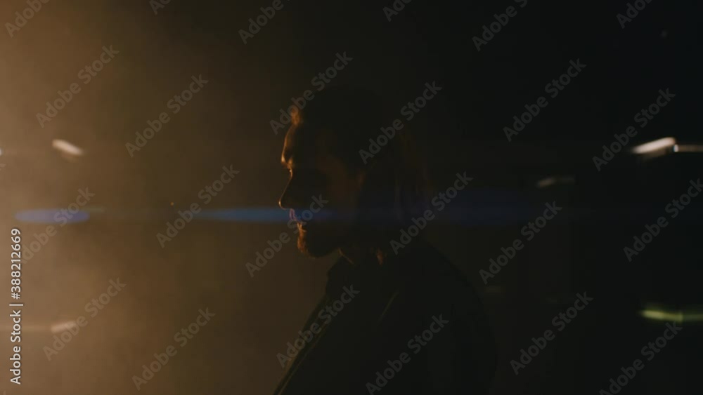 a man sitting in an empty club