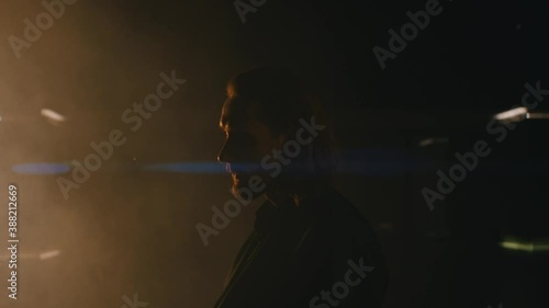 a man sitting in an empty club
