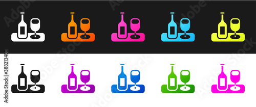 Set Wine bottle with glass icon isolated on black and white background. Vector.
