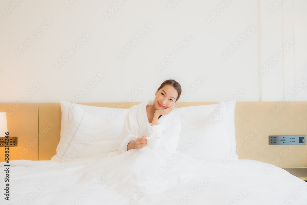 Portrait beautiful young asian woman smile relax leisure on bed Portrait beautiful young asian woman smile relax leisure on bed
