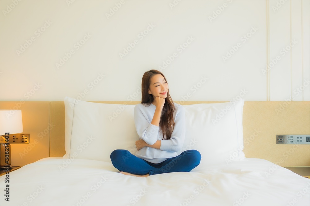 Portrait beautiful young asian woman smile relax leisure on bed Portrait beautiful young asian woman smile relax leisure on bed