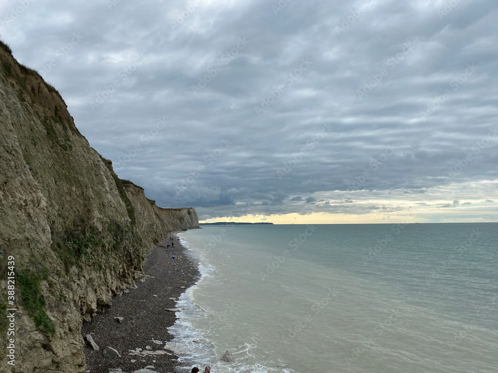 French cliffs of the opal coast at high tide in autumn on a cloudy day.