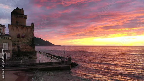 tramonto sul borgo di Santa Maria di Castellabate, Cilento, Campania, Mar Mediterraneo e Tirreno. Ripresa aerea con drone. sunset over the village, Mediterranean and Tyrrhenian Sea. Aerial shot  photo