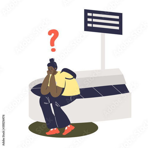 Upset woman passenger sitting at luggage carousel without suitcase. Baggage lost accident