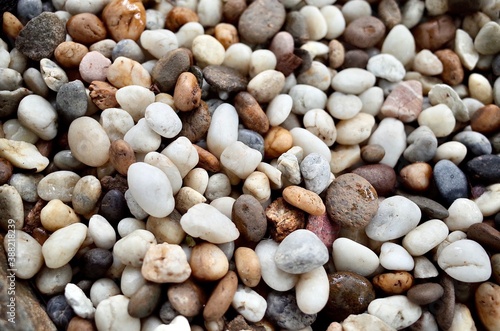 Close up textured pebble stone, small pebbles stone