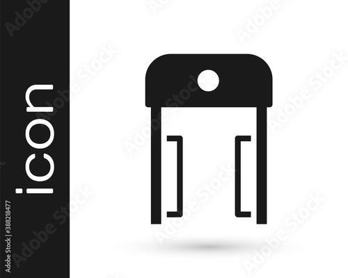 Black Metal detector in airport icon isolated on white background. Airport security guard on metal detector check point. Vector.