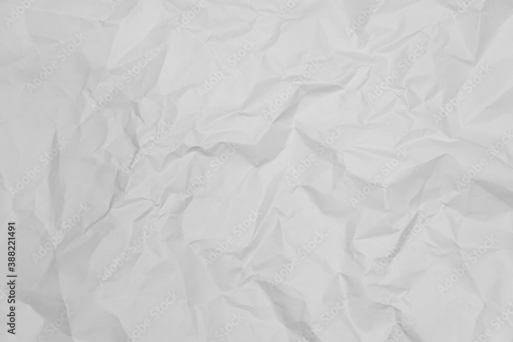 Obraz premium White crumpled paper texture background.