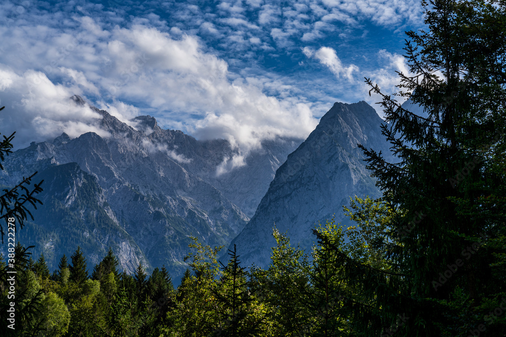 mountain view of the karwendel mountains with clouds in bavaria, germany
