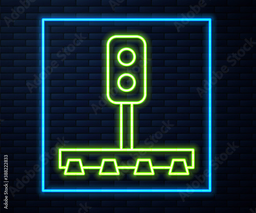 Glowing neon line Train traffic light icon isolated on brick wall background. Traffic lights for the railway to regulate the movement of trains. Vector.