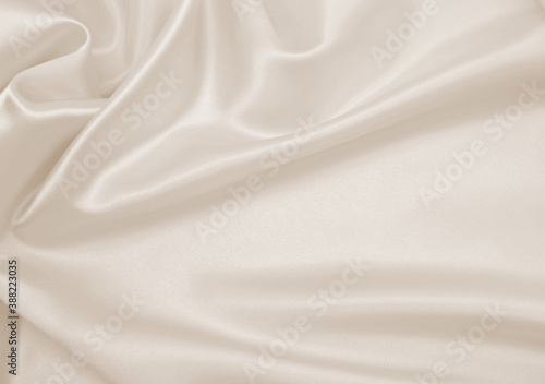  Smooth elegant golden silk or satin luxury cloth texture as wedding background. Luxurious background design. In Sepia toned. Retro style