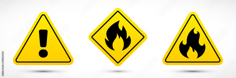 Hazard attention signs set. Fire risk warning sign. Black flame symbol on yellow isolated on white background. Vector illustration. Hazard attention signs set. Fire risk warning sign. Black flame symbol on yellow isolated on white background. Vector illustration.