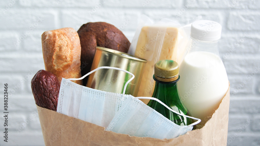 Naklejka premium Online purchase of products and protective medical masks during the quarantine coronavirus. Stay at home. Covid-19 period. Self-isolation.Free food delivery.