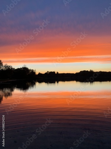 sunset over lake © Bohdan
