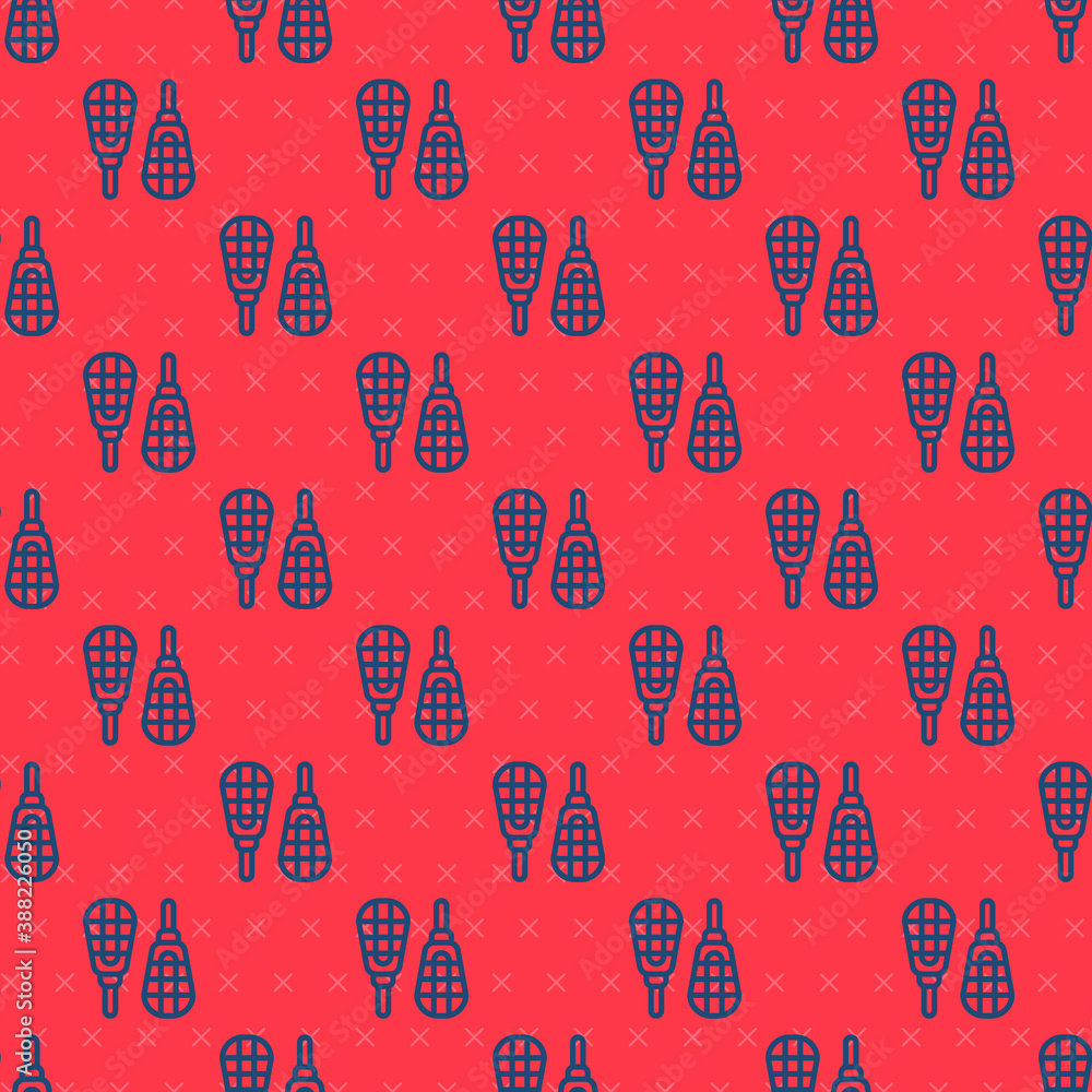 Blue line Snowshoes icon isolated seamless pattern on red background. Winter sports and outdoor activities equipment. Vector.