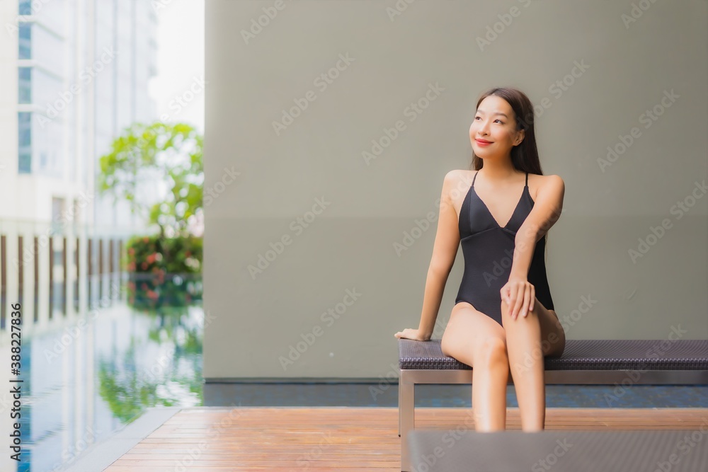 Portrait beautiful young asian woman relax smile around outdoor swimming pool Portrait beautiful young asian woman relax smile around outdoor swimming pool