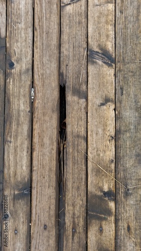 old wood texture with hole