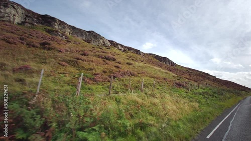 The A68 is a major road in the United Kingdom, running from Darlington in England to the A720 in Edinburgh. Driving on A68 road - Northumberland - United Kingdom - 18th of September 2020 photo