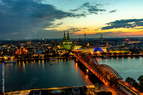 Germany, Cologne, a large body of water with a city in the background