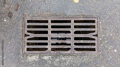 cover on the street (drainage grate)