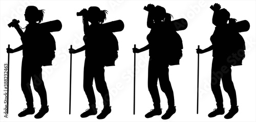 Girl tourist with a large backpack behind back and a walking stick in hand. Woman holds binoculars in hand, watches intently. Hiking. Ornithology. Black silhouettes are isolated on a white background.
