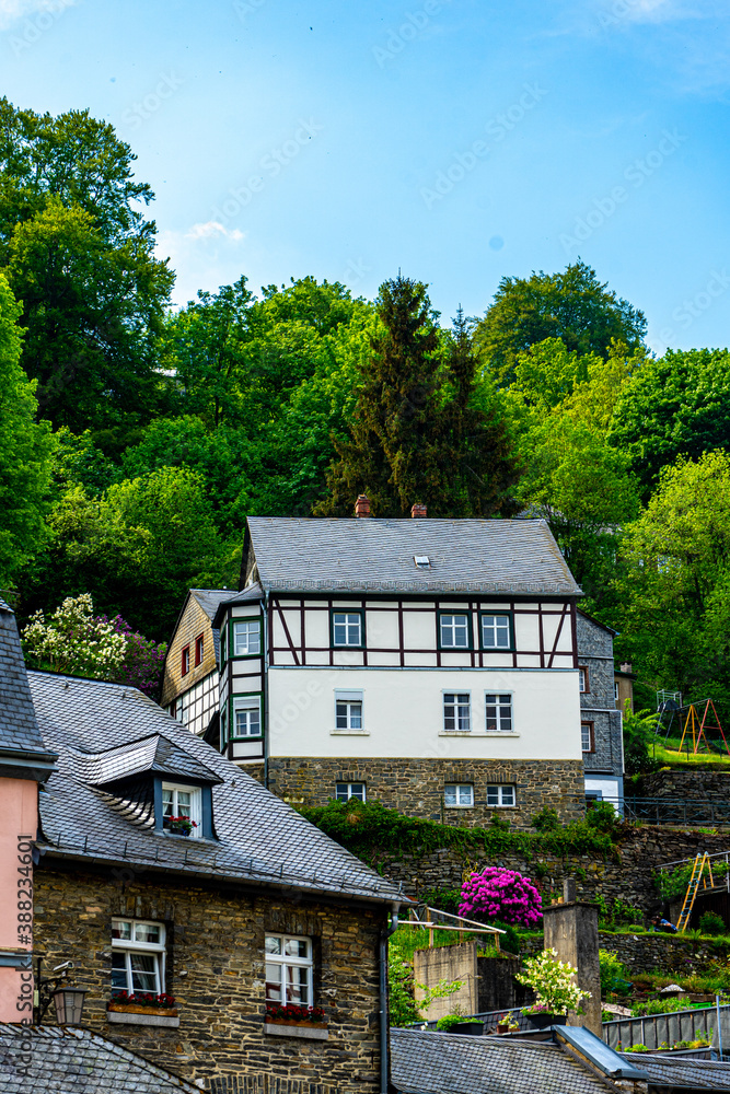 Germany, Monschau, a house with trees in the background