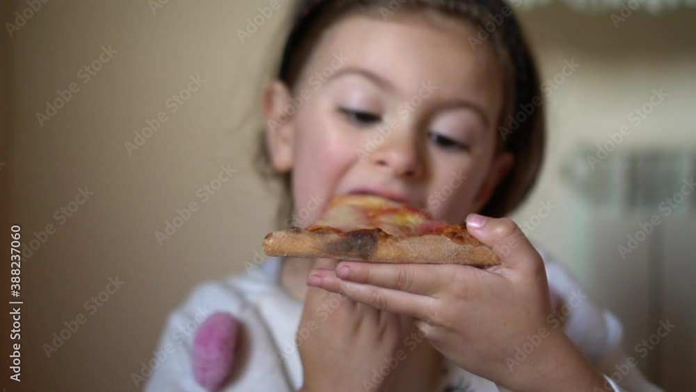 Little girl aged five eating p Little girl aged five eating p