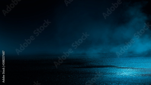 Dark cold wet street, asphalt, neon light. Reflection of neon in water. Empty night street scene, night city, smoke. abstract dark empty scene abstract night landscape neon blue light silhouettes