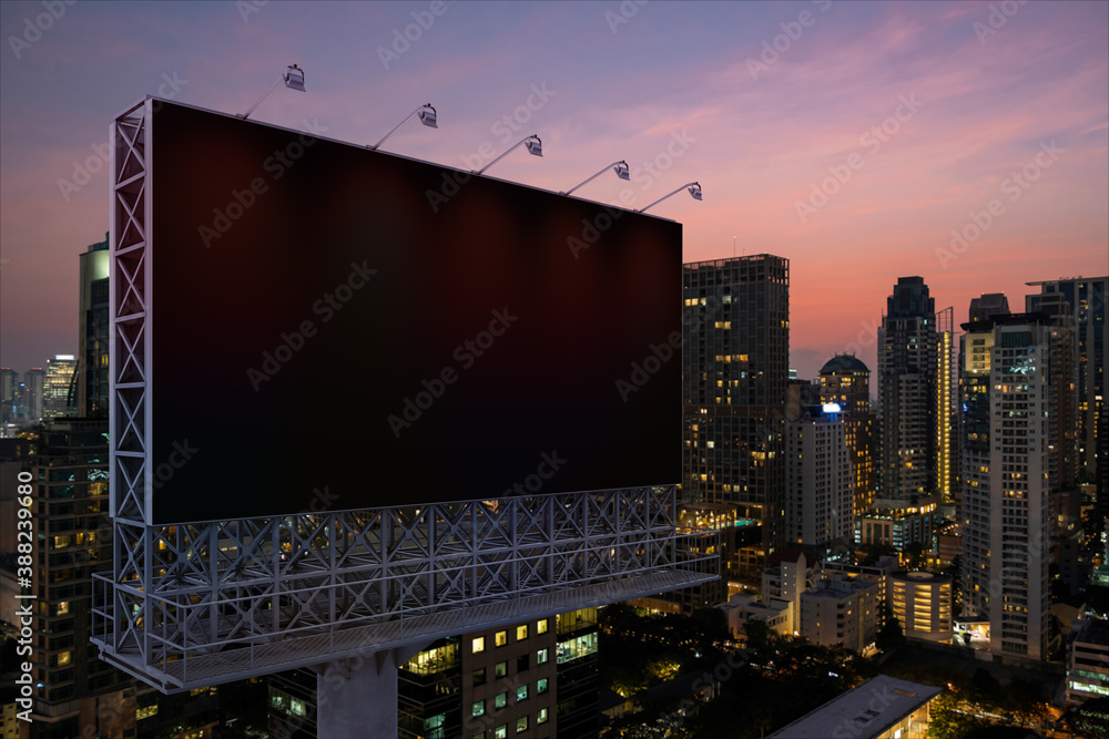 Blank black road billboard with Bangkok cityscape background at night time. Street advertising poster, mock up, 3D rendering. Side view. The concept of marketing communication to promote idea. Blank black road billboard with Bangkok cityscape background at night time. Street advertising poster, mock up, 3D rendering. Side view. The concept of marketing communication to promote idea.