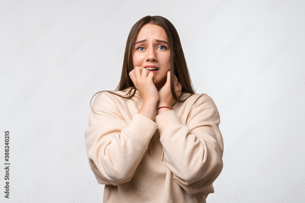Portrait of the scared woman with long chestnut hair Portrait of the scared woman with long chestnut hair