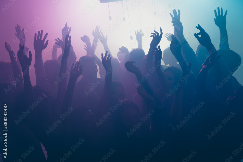 Photo of big company many carefree people raise arms concert wear stylish trendy outfit modern club indoors