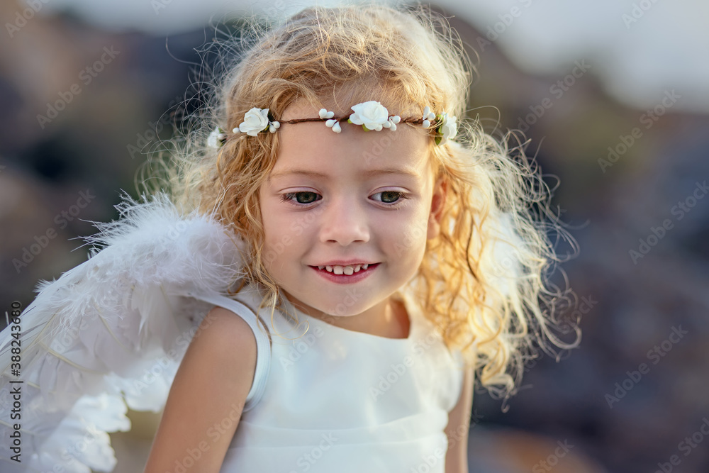 Beautiful little girl with angelic wings Beautiful little girl with angelic wings