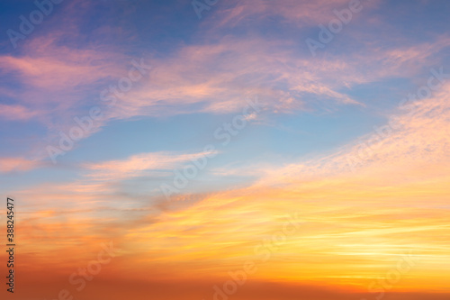 Real sunrise sundown sky with gentle colorful clouds