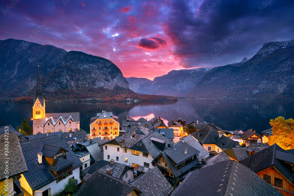 Hallstatt, Austria. Cityscape image of iconic alpine village Hallstatt at dramatic autumn sunrise.