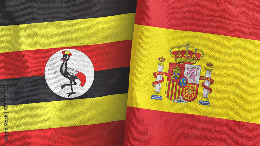 Fototapeta premium Spain and Uganda two flags textile cloth 3D rendering