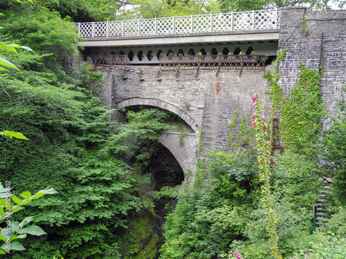 Devil's Bridge in Pontarfynach - Wales. The bridge is unusual in that three separate bridges are coexistent, each one built upon the previous bridge dating back to the 11th century. photo