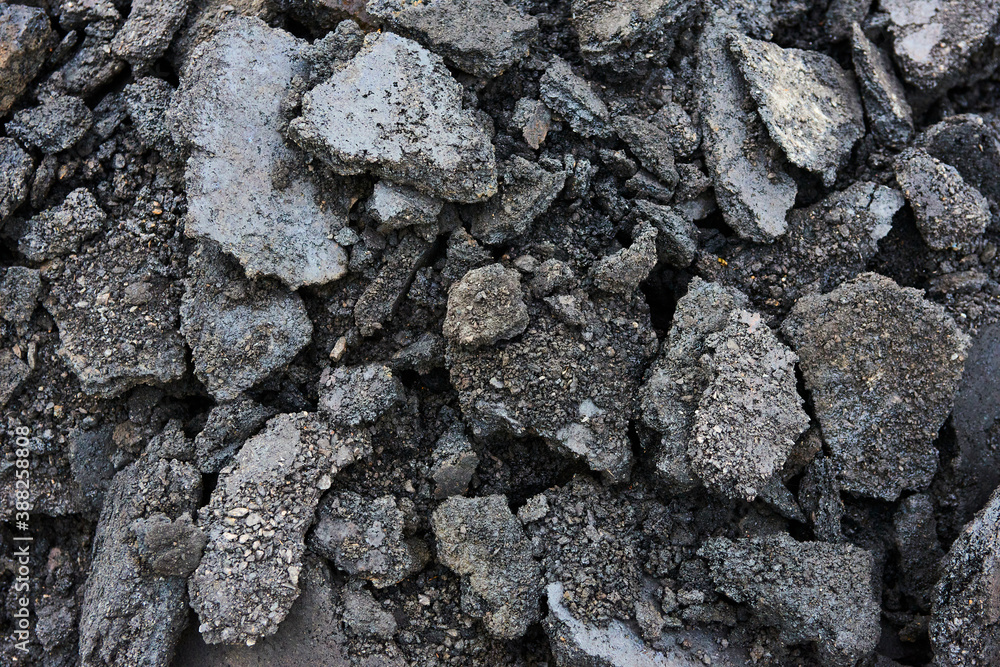 Broken pieces of asphalt at a construction site. Recycling and reuse crushed concrete rubble, asphalt, building material, blocks. Crushed сoncrete Background.
Broken pieces of asphalt at a construction site. Recycling and reuse crushed concrete rubble, asphalt, building material, blocks. Crushed сoncrete Background.