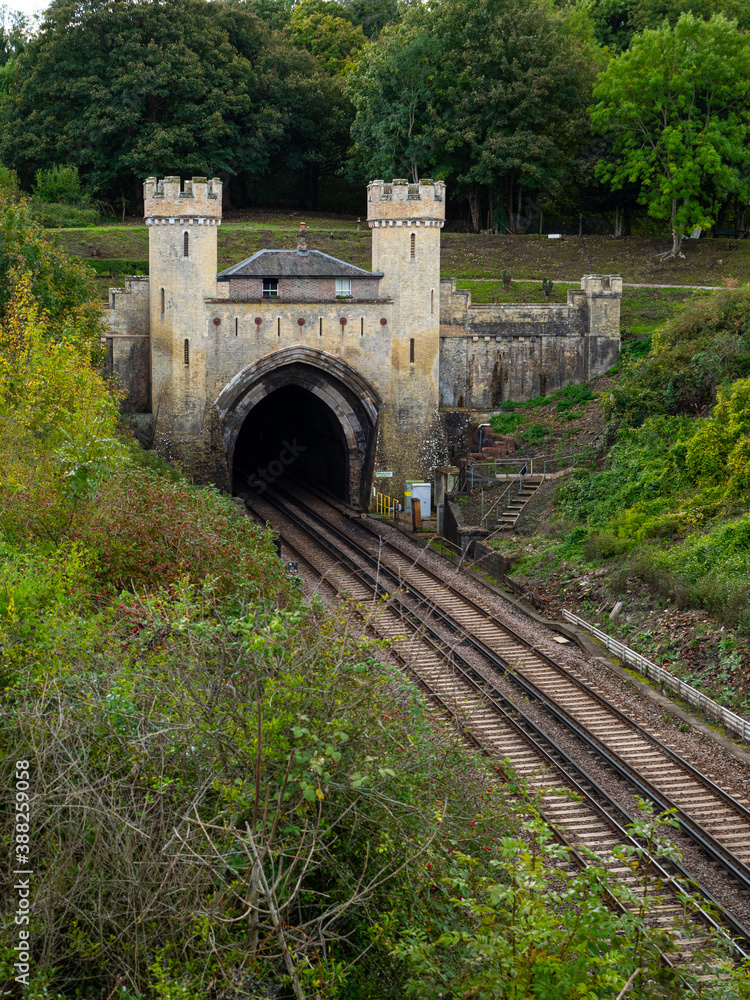 Clayton Tunnel at Pyecombe, Sussex, UK, on the main London-Brighton railway line, is noted for its medieval castle-style entrance.