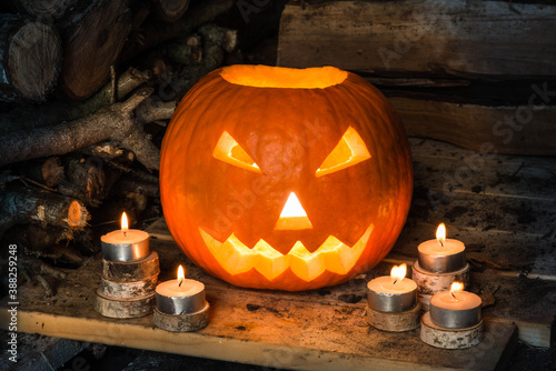 Halloween pumpkin angry face in darkness