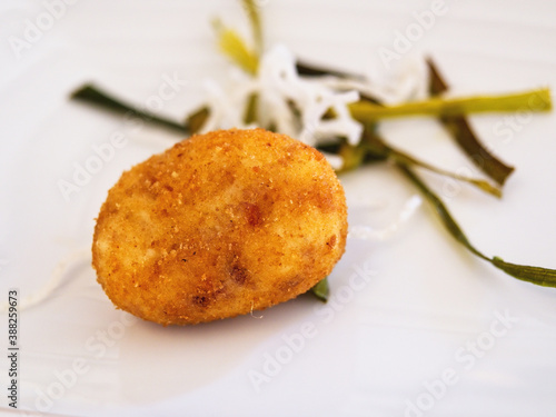 Typical aperitif croquette of Spanish gastronomy photo