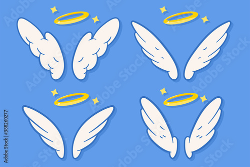 Angel wings and halo vector cartoon set isolated on background.