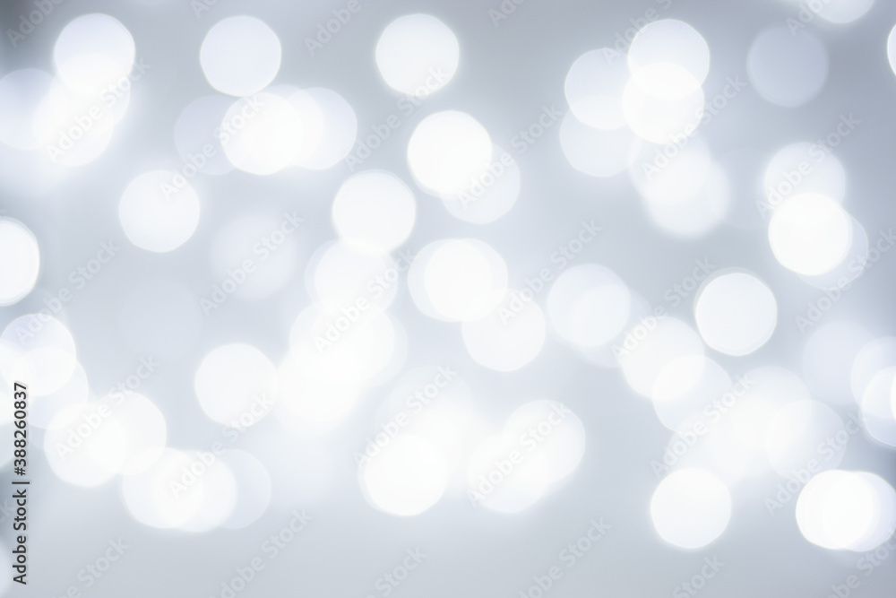 Defocused background with twinkling lights. Blurry bokeh. Christmas background. Defocused background with twinkling lights. Blurry bokeh. Christmas background.