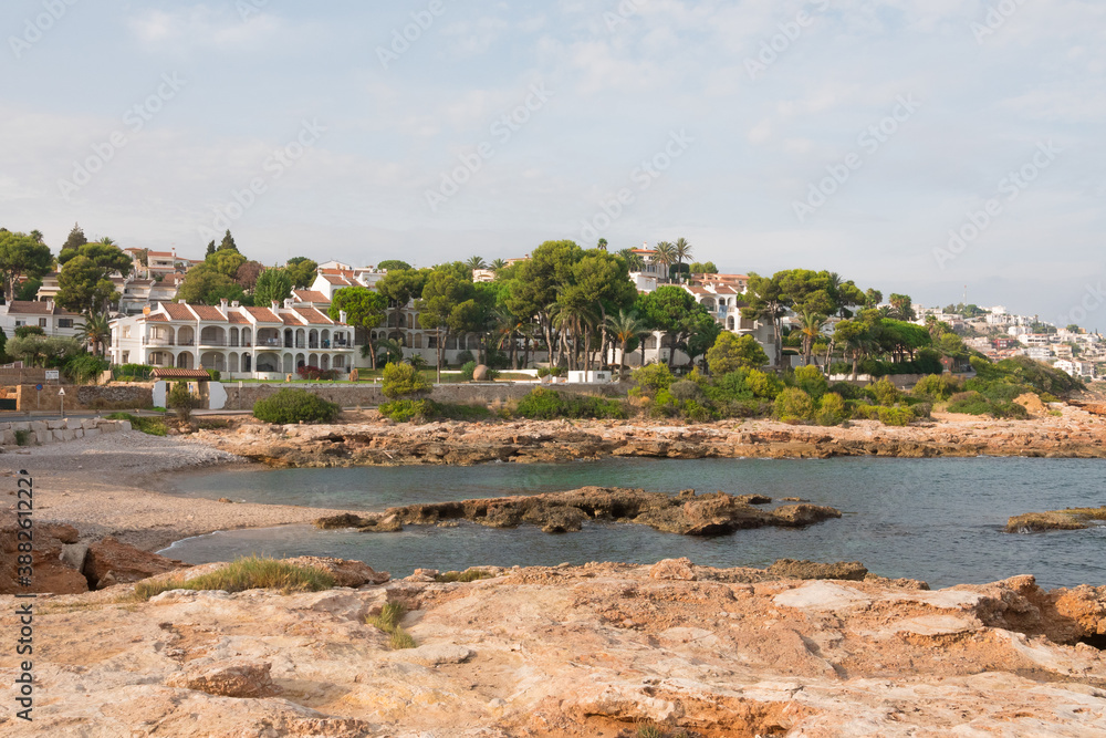 Beautiful shot of Peniscola houses on the mediterranean coast. Waterfront of the Costa del Azahar, Valencian community, Spain. Historical city. Beautiful shot of Peniscola houses on the mediterranean coast. Waterfront of the Costa del Azahar, Valencian community, Spain. Historical city.