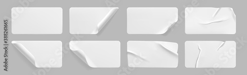 White glued crumpled stickers with curled corners mock up set. Blank white adhesive paper or plastic sticker label with wrinkled and creased effect.