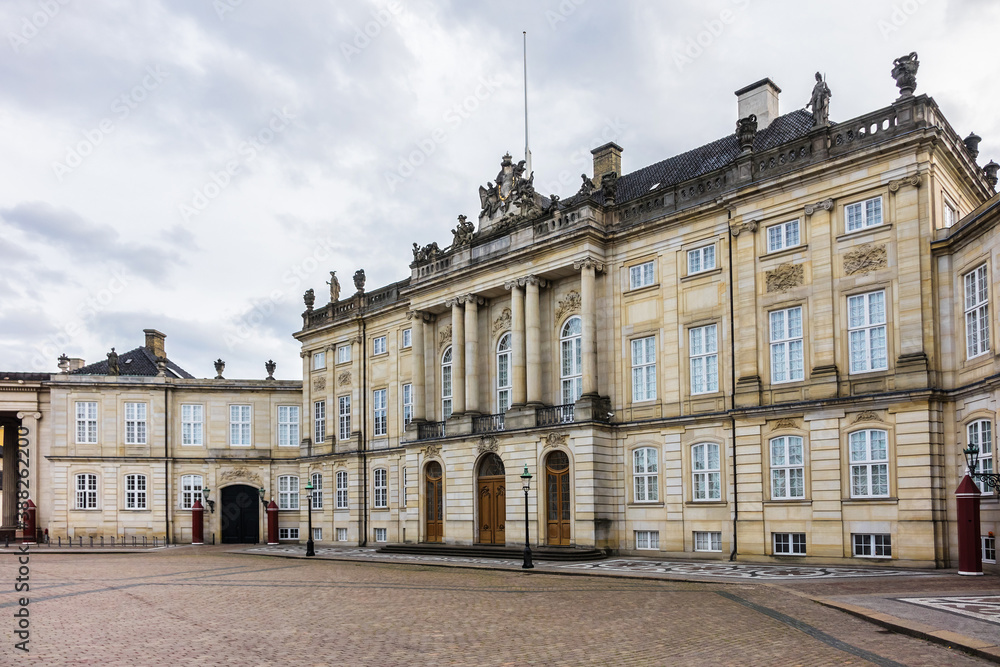 Amalienborg Palace (1760) - home of the Danish royal family. Royal Palace consists of four identical classical palace facades. Copenhagen, Denmark.