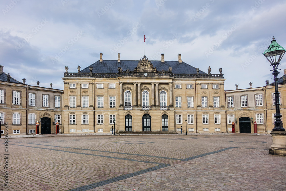 Fototapeta premium Amalienborg Palace (1760) - home of the Danish royal family. Royal Palace consists of four identical classical palace facades. Copenhagen, Denmark.